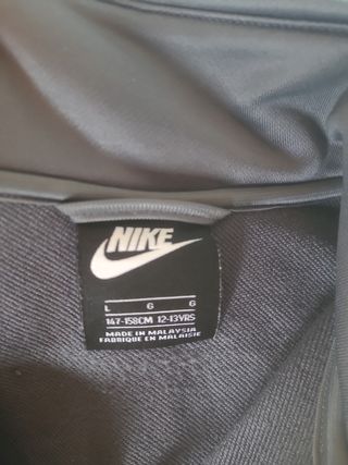 Chaqueta nike gris talla l niño