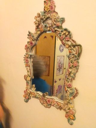 Dos espejos porcelana.