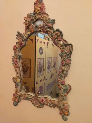 Dos espejos porcelana.