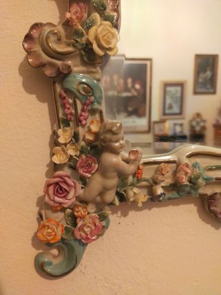 Dos espejos porcelana.