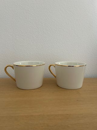 Coppia di tazze bianco e oro