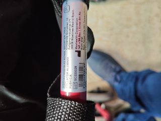 Andador plegable rojo con bolsa