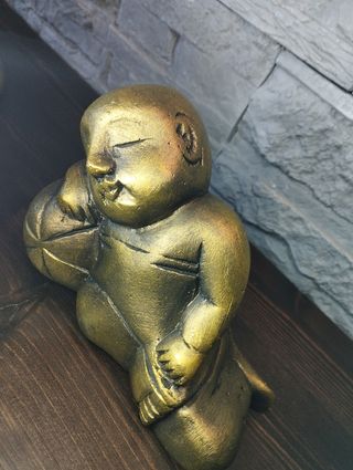 Pensatore scultura fermalibri design