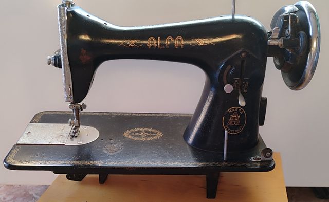Maquina de coser alfa antigua