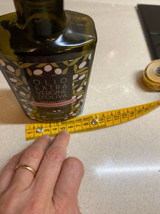 2 bottigliette vuote  in vetro smaltato per olio