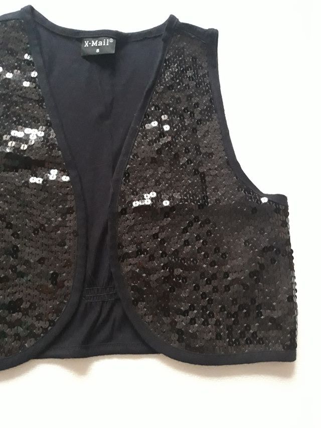 Gilet con paillettes
