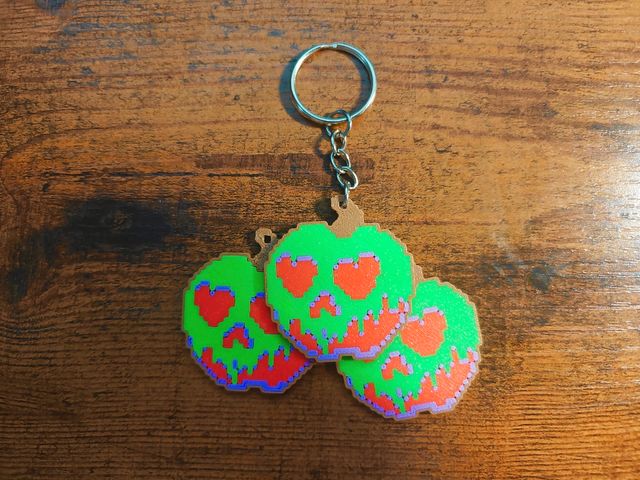 Llavero Manzana envenenada disney