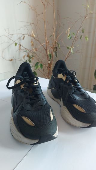 Puma RSX negras y doradas