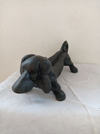 Figura Hierro Raspador de Botas.