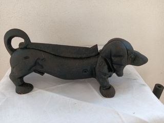 Figura Hierro Raspador de Botas.