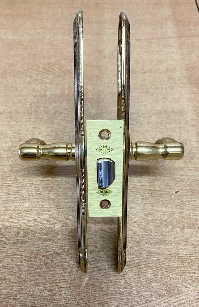 8 juegos manillas latón