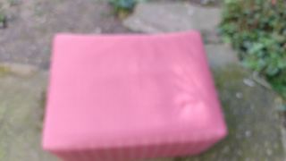 Reposa pie fucsia