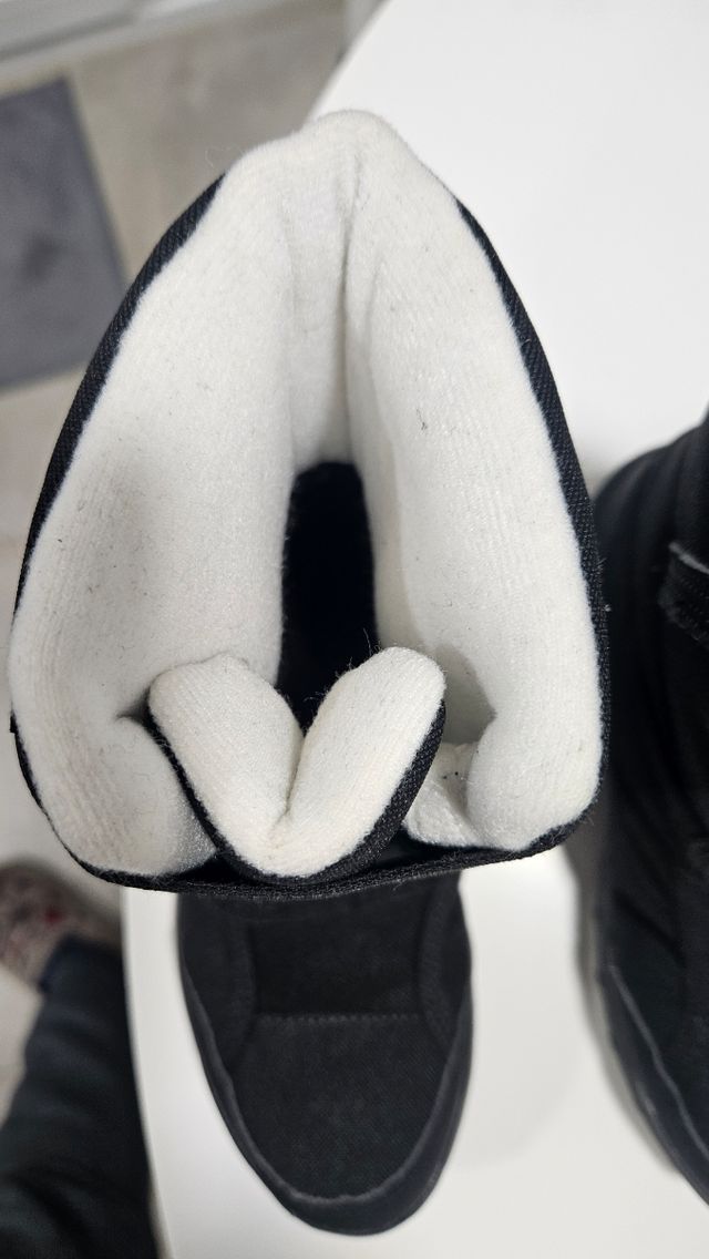 Botas de nieve o descanso niño