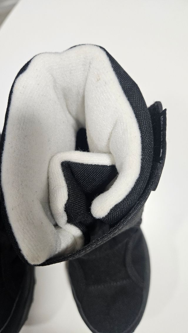 Botas de nieve o descanso niño