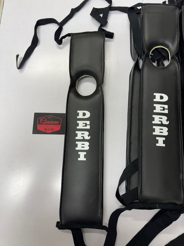 Cubre deposito corbata Derbi antorcha