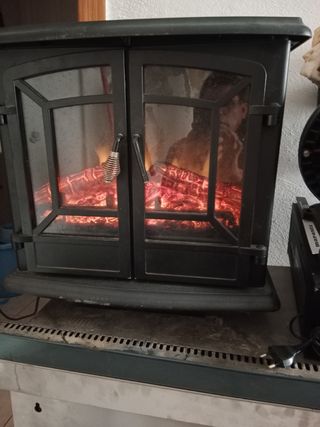Vendo estufa elect de carbón artificial