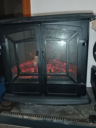 Vendo estufa elect de carbón artificial