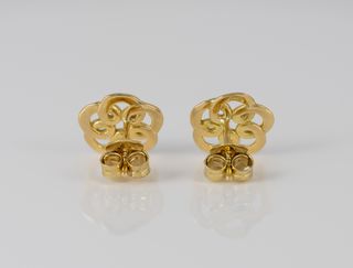 Pendientes Tous Flor en oro amarillo 18k