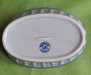 Ciotola ovale con manici in porcellana