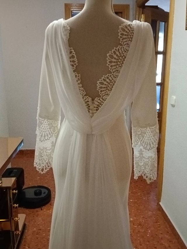 Vestido novia precioso.