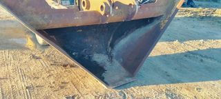 Cazo de talud o cunetero para giratoria