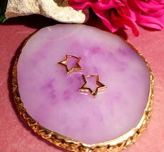 Pendientes aro de estrella acero inox.