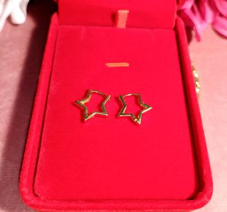 Pendientes aro de estrella acero inox.