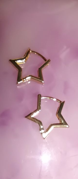 Pendientes aro de estrella acero inox.