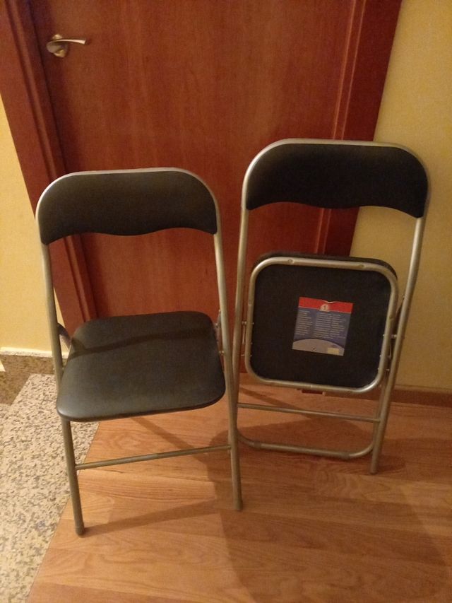 2 Sillas plegables,sin estrenar polipiel