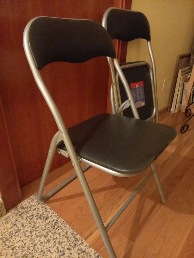2 Sillas plegables,sin estrenar polipiel