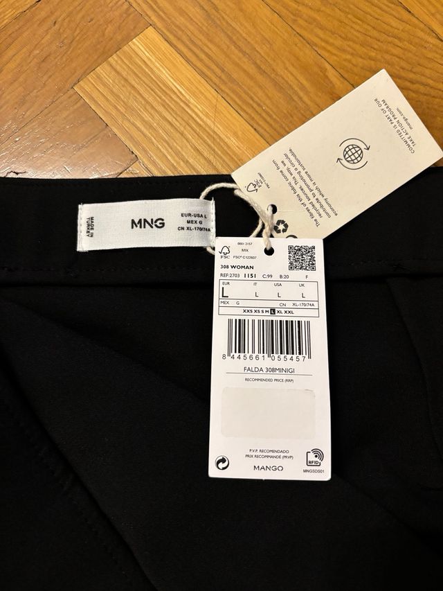 Falda mango de la talla L con detalle fruncido