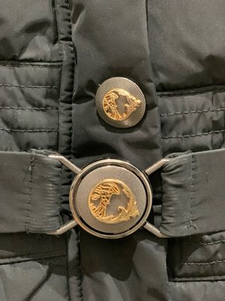 Gianni Versace plumifero