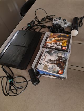 PS3 slim con accessori e giochi