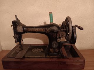 Maquina de coser Singer antigua