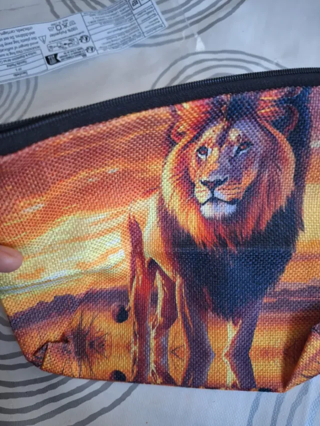 Neceser león atardecer