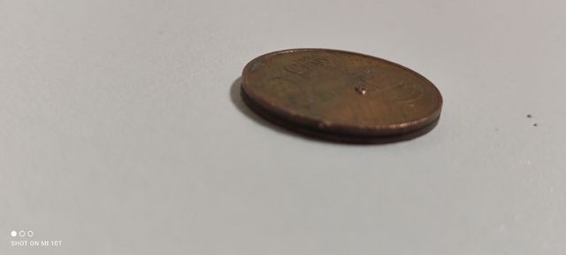 Moneda 2 céntimos exceso de metal Año 1999