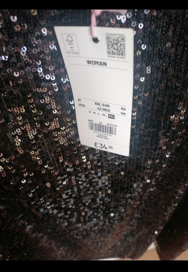 T shirt nera elegante con paiette luccicanti