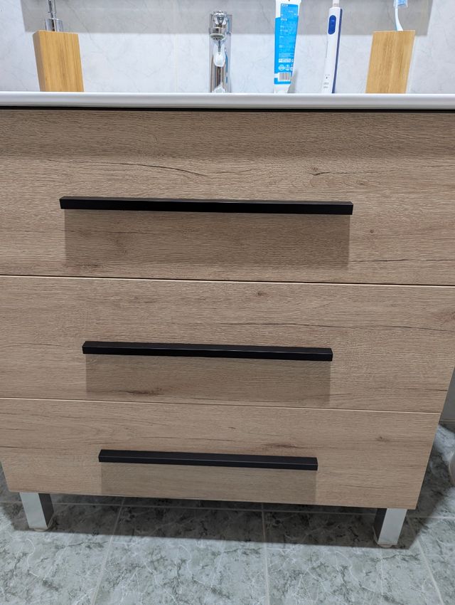 9 tiradores muebles baño