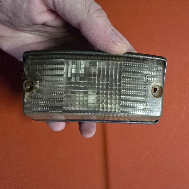 Faro posteriore e freccia Vespa