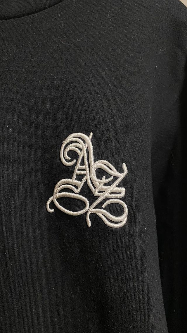 SUDADERA NEGRA AREA ZERO