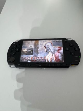 Sony PSP Slim 2004 y muchos juegos