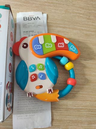 Juguete musical musical sensory tucan