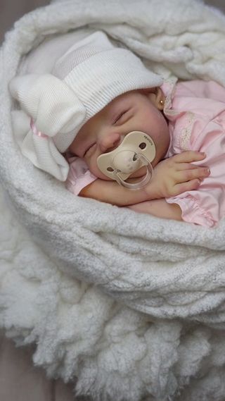 Bebé reborn de silicona parcial