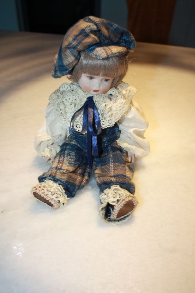 Bambola in porcellana bambino