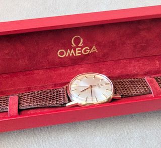 Reloj omega automático oro