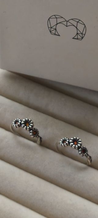 Anillo trio de margaritas plata de ley