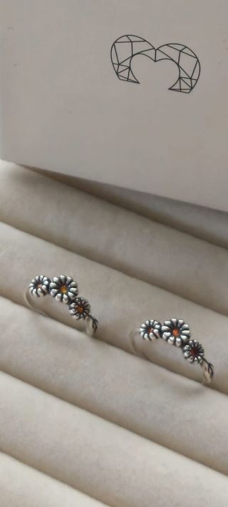 Anillo trio de margaritas plata de ley