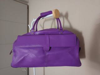 Bolsa de viaje marca Marks Spencer. 