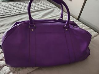 Bolsa de viaje marca Marks Spencer. 