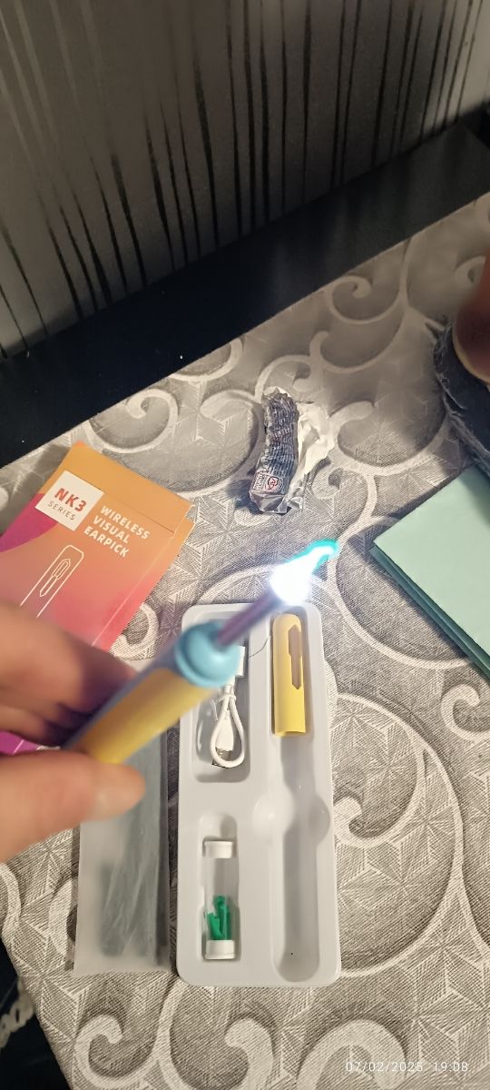 Pulisci orecchie con telecamera